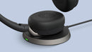 Jabra Evolve2 65 Flex on wireless charging pad